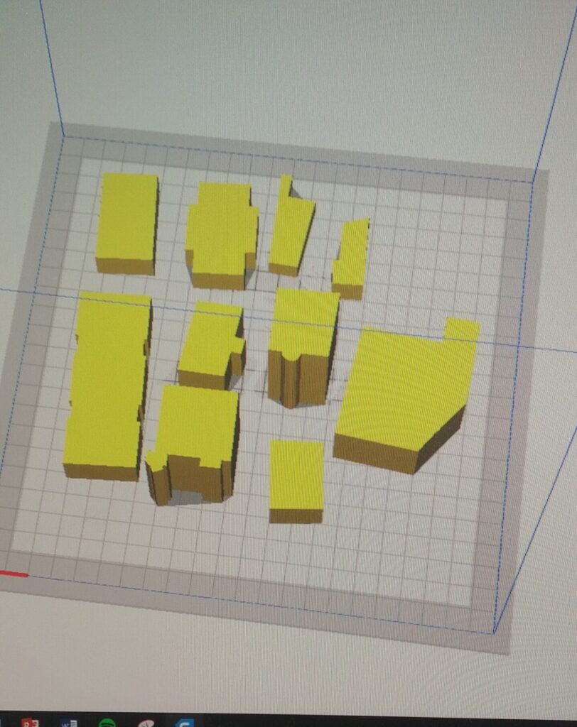 Detaļu izklājums uz printera pamatnes